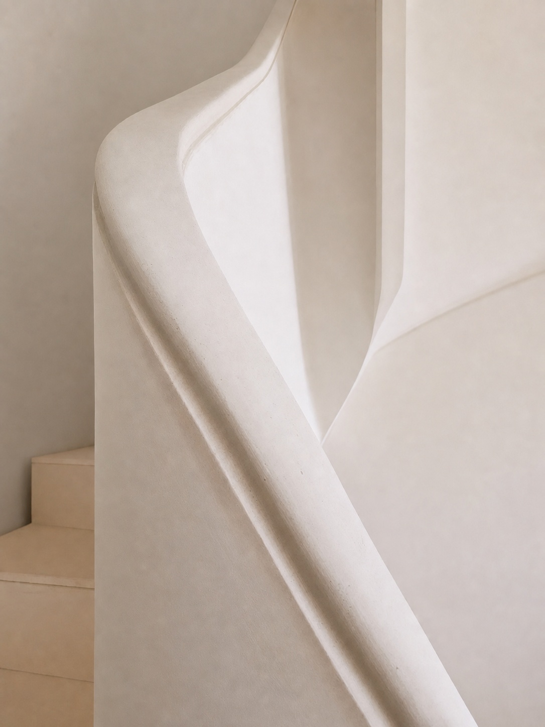 Escalier sur voûte — limon et marches enduits au plâtre